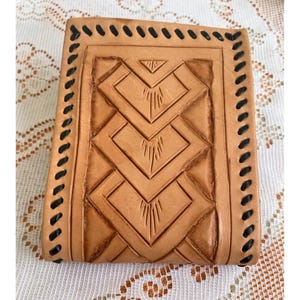 Cartera plegable vintage de cuero repujado de los años 70