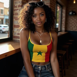 Celebrate Senegal in this vibrant adjustable strap tank, perfect for AFCON, World Cup matches, concerts, and cultural festivals. Featuring boxing pioneer Battling Siki. Also great for Ghana, Mali, Guinea, Cameroon, Ethiopia, and Bolivia—ideal for bold green-yellow-red color combinations and global football pride.