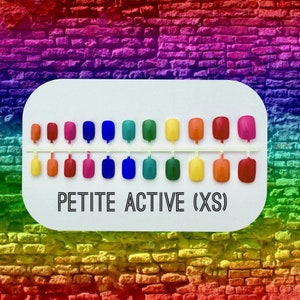 Petite Active (XS) press on nails. Image has 24 nails in rainbow color on a rainbow background