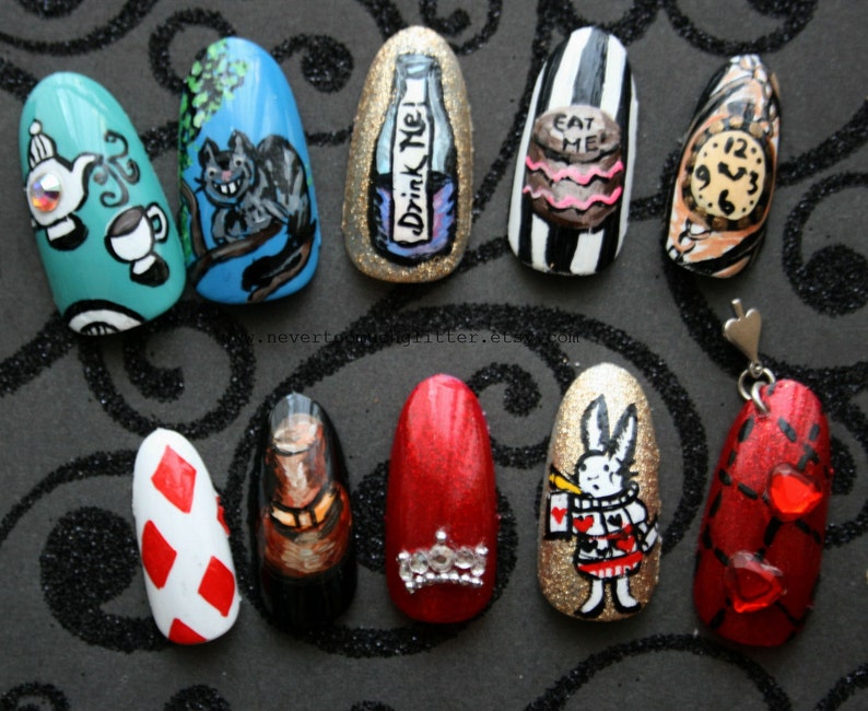 Ten hand-painted press on nails depicting images from Alice In Wonderland - Tea, Cheshire Cat, "Drink Me" bottle, "Eat Me" cake, clock, top hat, rabbit and playing card
