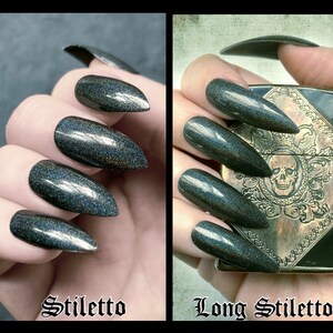 Two photos of a white female hand wearing black holographic stiletto nails. Text read stiletto and long stiletto under relevant photo.