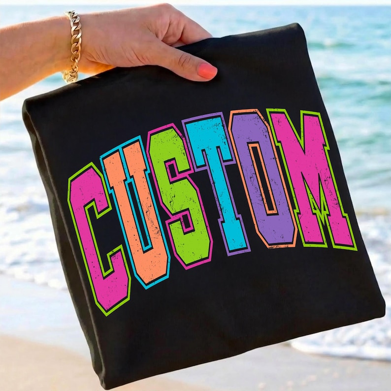 Example of a custom summer text design using the Neon Summer PNG Bundle on a t-shirt