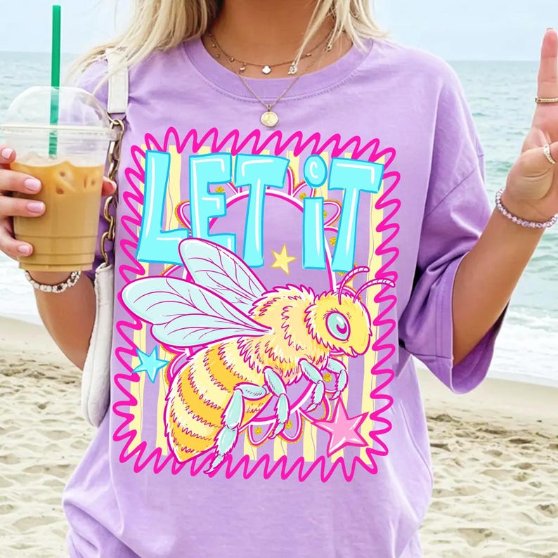 Close-up of the 'Let It Bee Positivity' digital design featuring a hand-drawn preppy bumblebee with wavy borders and stars in pastel pink and yellow.