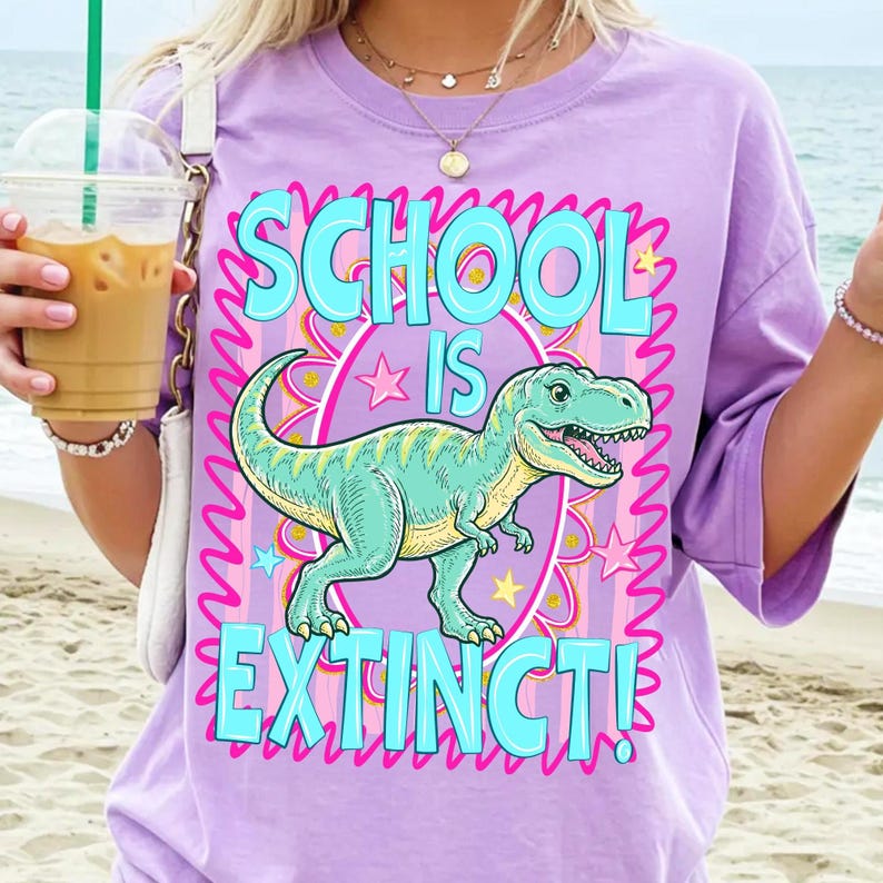 Mockup of a student wearing a t-shirt with the 'School Is Extinct' T-Rex design, celebrating the last day of school.