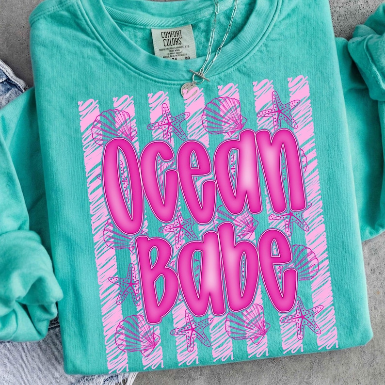 Mockup of a white t-shirt showcasing a 'Striped Sunshine' sublimation design with a retro beach ball and 'Beach Vibes' text.