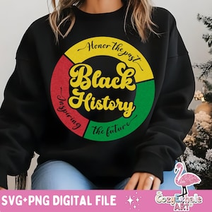 May include: Black sweatshirt with a colorful circle graphic that says "Honor the past, Black History, Inspiring the future".