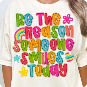 Spread joy with this “Be The Reason Someone Smiles Today” boho PNG! A floral hand-lettered design perfect for uplifting shirts, sublimation, DTF transfers, and promoting mental health and positivity all summer long.