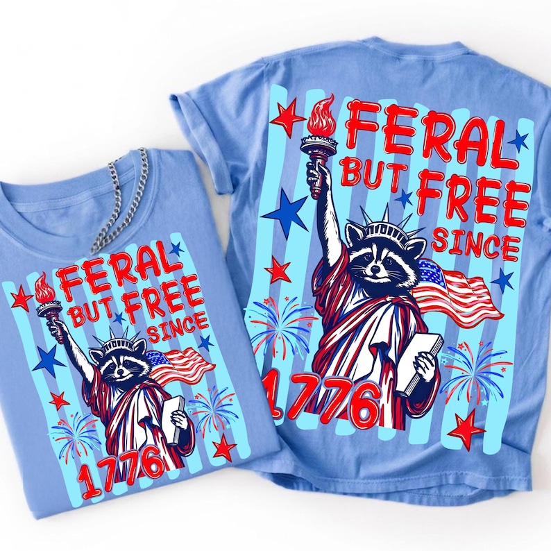 High-resolution Feral But Free funny raccoon 4th of July PNG digital file with transparent background.