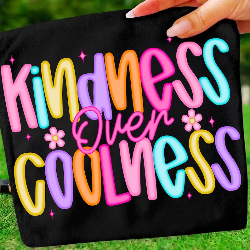 Close-up of the 'Be Kind' typography with retro sparkle detail from the digital design