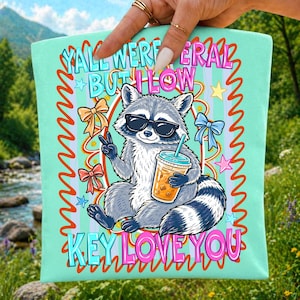 feral raccoon png, teacher humor png, last day of school, yall were feral, low key love you, unhinged teacher, summer break png, gen z teacher gift, raccoon sublimation, funny student quote, coquette raccoon, end of school year, teacher sublimation