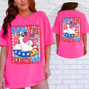 May include: Bright pink t-shirt featuring a cartoon goose wearing sunglasses and a patriotic hat, floating on a blue and white inner tube. The text "CHILL THE FOURTH OUT" is displayed in a wavy font. The back of the shirt has the same design.
