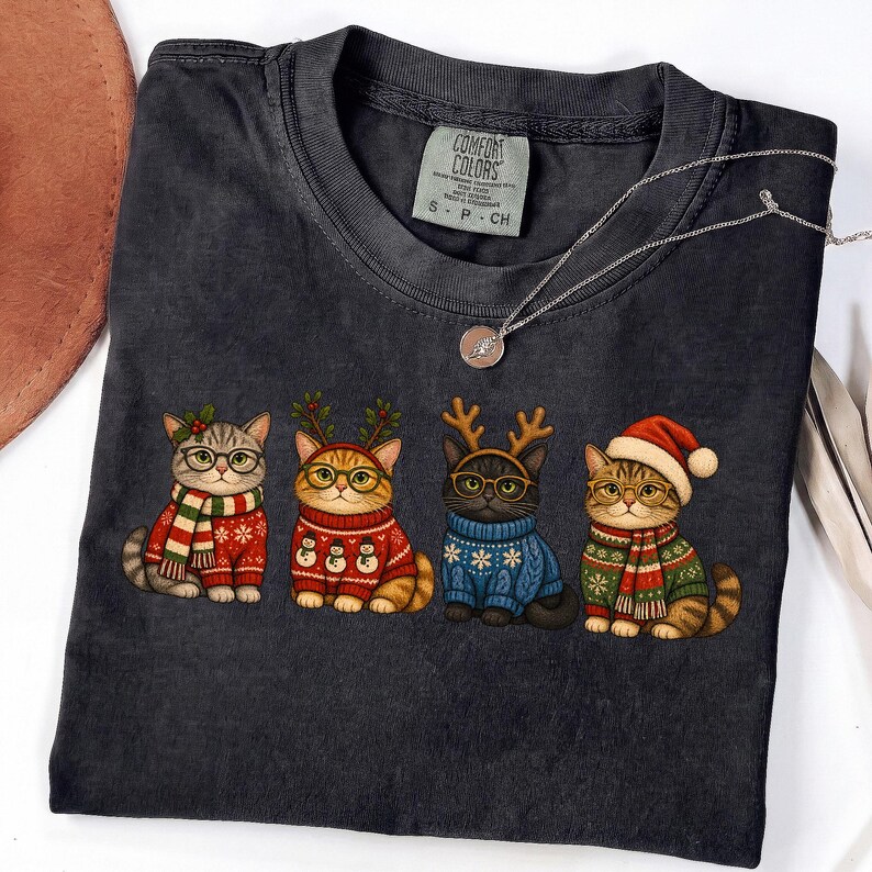 Cozy Christmas cat PNG graphic design close-up detail