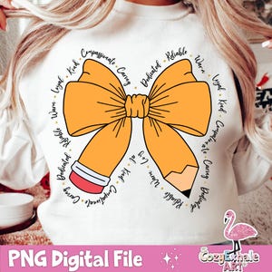 May include: A white sweatshirt featuring a yellow bow and a pencil design. The bow and pencil are encircled by words describing positive character traits, such as "kind", "compassionate", "caring", "reliable", and "dedicated".