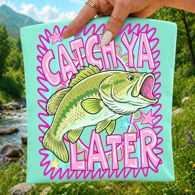 Mockup showing the 'Catch Ya Later Bass Fishing' design on a pink t-shirt, a white mug, and a beige tote bag