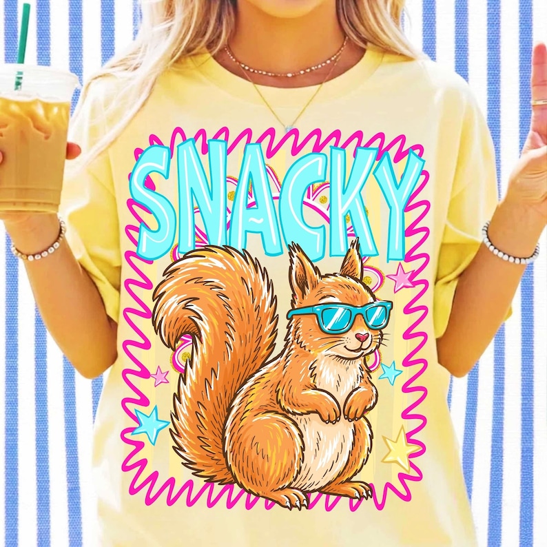 Example of a t-shirt featuring the Snacky Squirrel PNG sublimation design, highlighting its application.