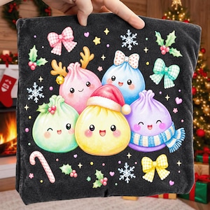 May include: A black fabric item featuring a graphic print of five colourful, smiling dumpling characters. The dumplings are decorated with festive elements including a Santa hat, reindeer antlers, a blue scarf, and various bows, snowflakes, and holly sprigs.