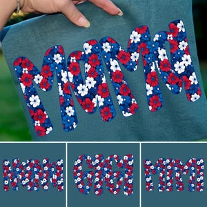 May include: A teal-colored fabric with the word "MOM" in large, stylized letters. The letters are filled with a floral pattern in red, white, and blue, resembling a patriotic design. Additional images show "MIMI" and "GIGI" in the same style.