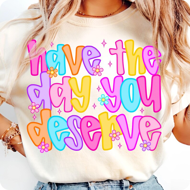 Example of the 'Have The Day You Deserve' design on a mock-up t-shirt, demonstrating its application