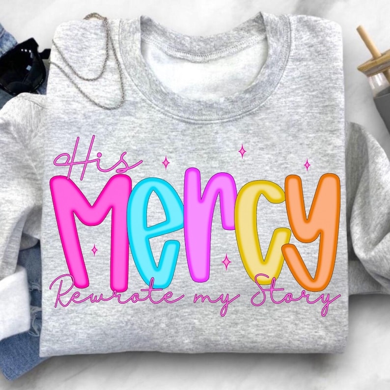 His Mercy Rewrote My Story Floral Christian PNG Design on a T-Shirt mockup