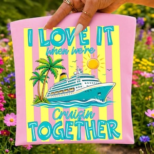 May include: Pink t-shirt with the text "I LOVE IT when we're Cruisin TOGETHER". The graphic features a cruise ship, palm trees, a sun, and birds. The text and graphics are in shades of blue, yellow, and green.