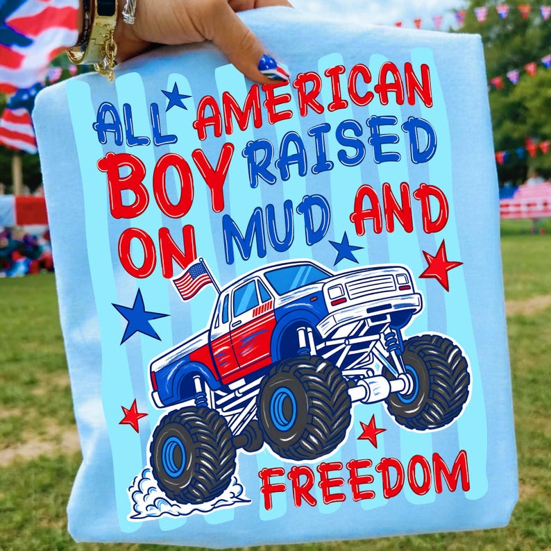 Example of the 'All American Boy Monster Truck' design applied to a t-shirt, showcasing its vibrant patriotic colors.