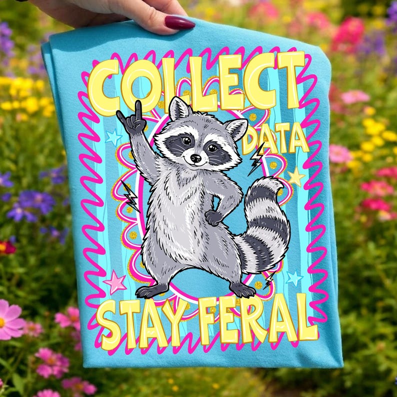 Stay Feral Raccoon Sublimation PNG Design on a t-shirt mockup