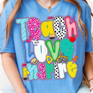 Teach, Love, Inspire! A vibrant PNG design perfect for back-to-school, teacher squads, or classroom celebrations. Great for preschool to 3rd grade, including speech therapists and special ed teachers. Ideal for first day, teacher gifts, or events.