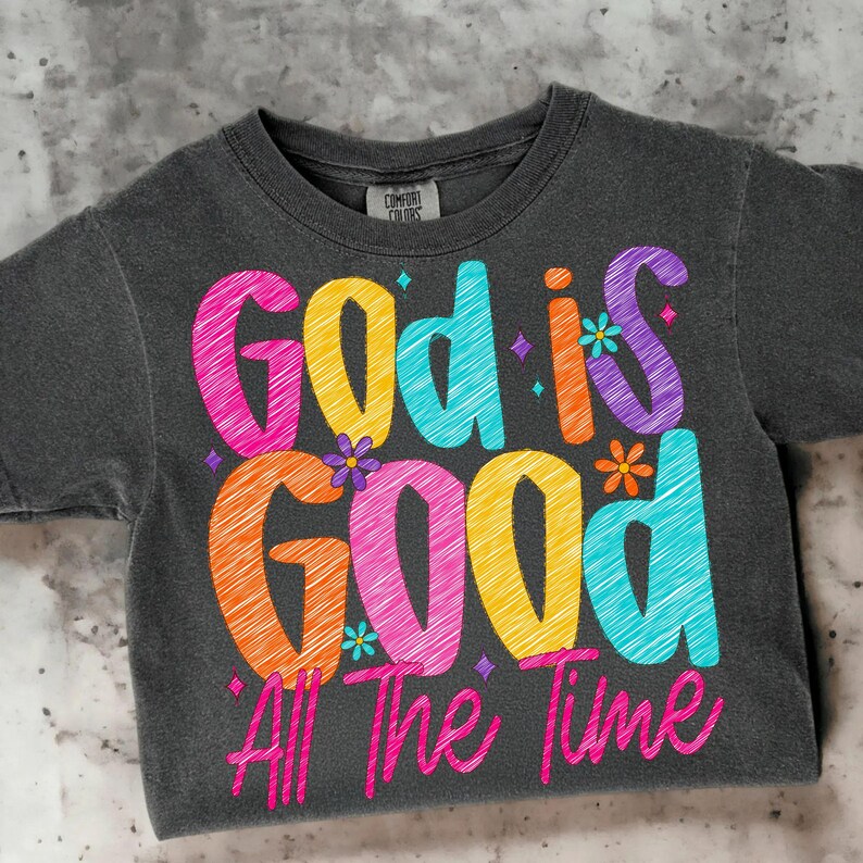 Mockup of the 'God Is Good All The Time' faith-based PNG design applied to a t-shirt, demonstrating its use in apparel.