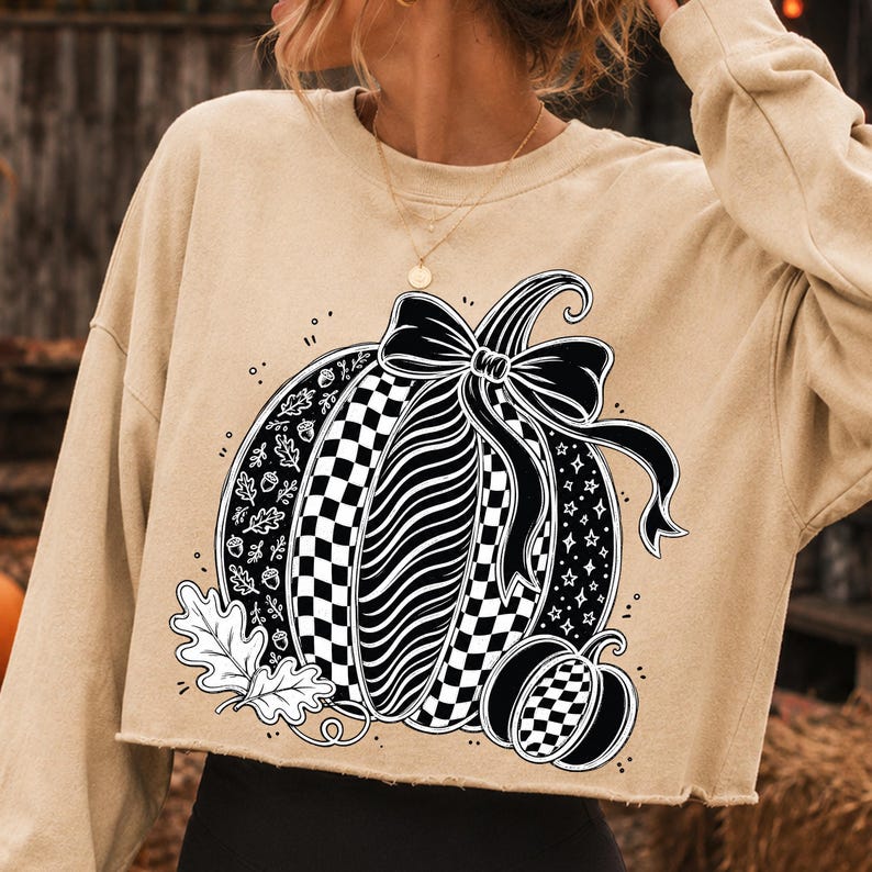 Close-up of Black and White Coquette Pumpkin Design with Bow and Autumn Elements
