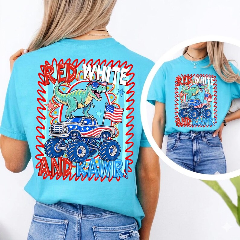 May include: A light blue t-shirt featuring a graphic of a green dinosaur wearing sunglasses on a monster truck with an American flag. The text on the shirt reads "RED WHITE AND RAWR!" in a red and white design.
