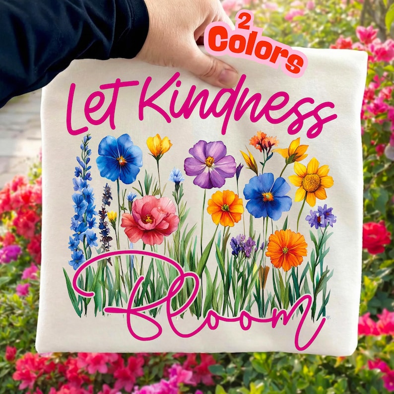 Let Kindness Bloom wildflower sublimation design on a rustic wooden background, showcasing vibrant boho floral graphics perfect for spring apparel.