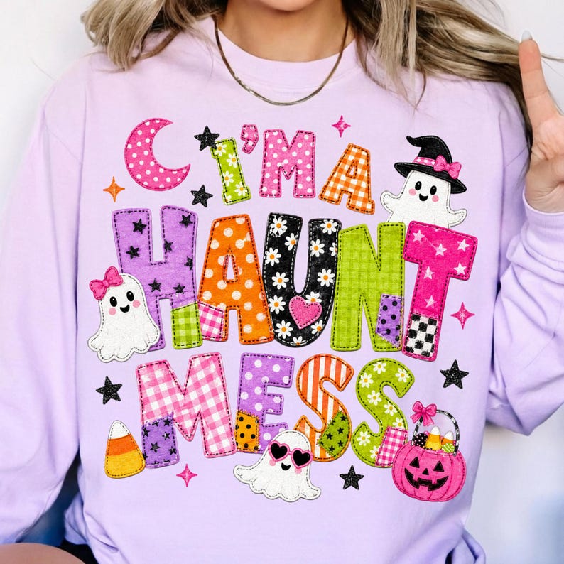 Close-up of 'I'm a Haunt Mess' patchwork ghost design with retro pink and pumpkin accents on a white background, perfect for Halloween sublimation.