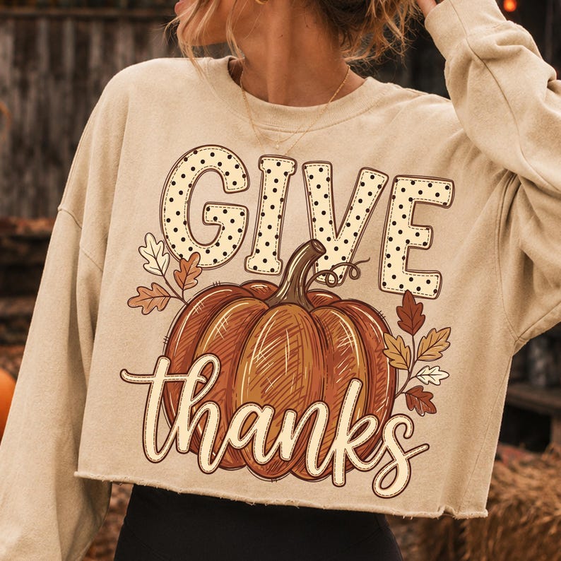 Close-up of the Give Thanks Pumpkin PNG design with autumn leaves and polka dot typography