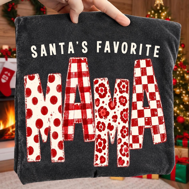 Santa's Favorite Mama sublimation design on a cozy white sweatshirt mockup