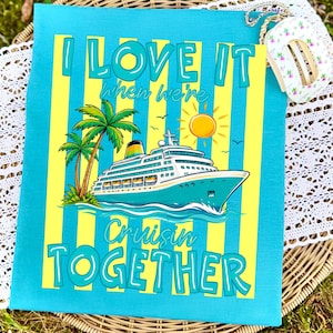 May include: A turquoise beach towel with yellow vertical stripes and a cruise ship graphic. The towel features the text "I LOVE IT when we're Cruisin' TOGETHER" in a playful font, with palm trees and a sun illustration.