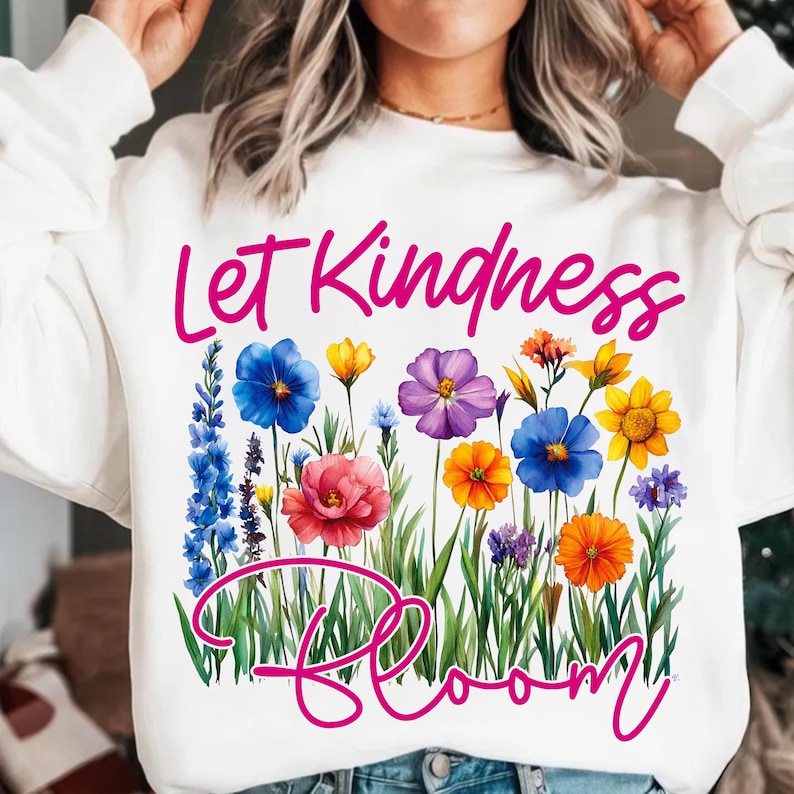 Mockup displaying the 'Let Kindness Bloom' spring floral PNG design on a t-shirt, highlighting its use for creative crafting projects.