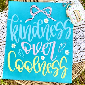 kindness over cool, be kind png, preppy coquette bow, positivity png, teacher shirt png, back to school png, mental health png, dtf transfer design, sublimation graphic, girly doodle art, boutique png design, preppy shirt art, pink bow aesthetic