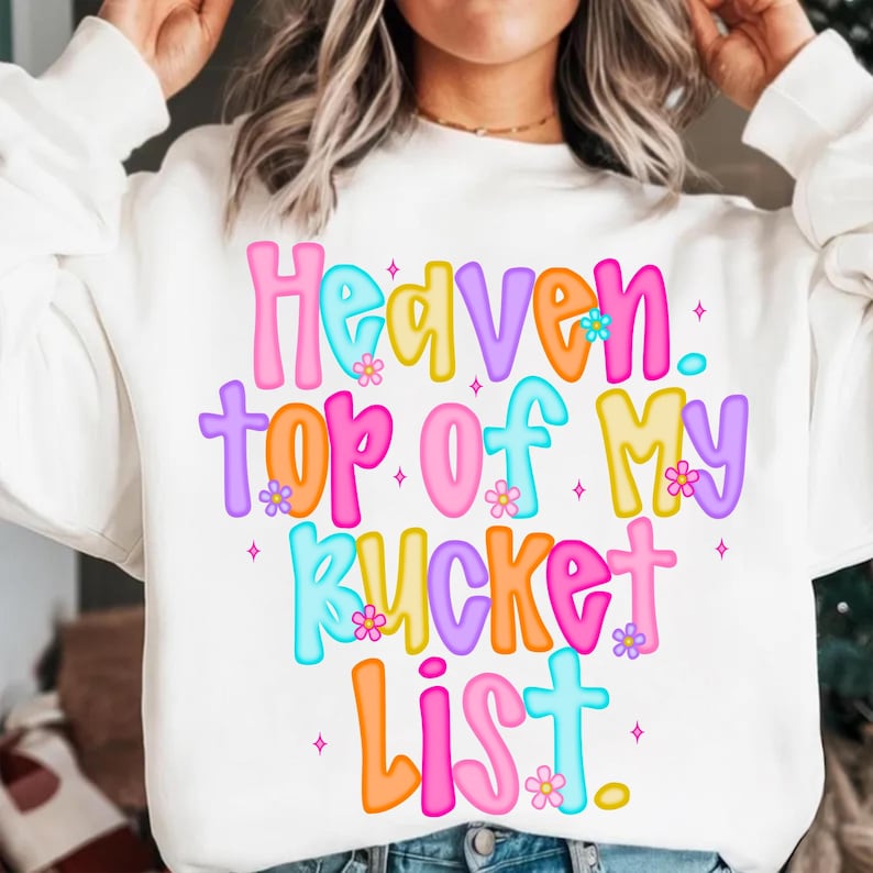 Close-up detail of the colorful typography and aesthetic floral elements in the 'Heaven Top Of My List' digital design.