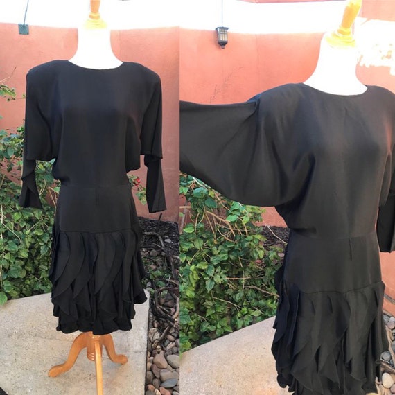 black dress with batwing sleeves