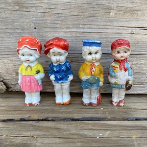 c1930s Group of 4 Frozen Charlotte Girl n Boy Colorful Figurine Dolls