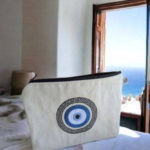 Monedero con forma de llave griega y diseño de ojo malvado – Bolsa con forma de ojo malvado – Recuerdo griego