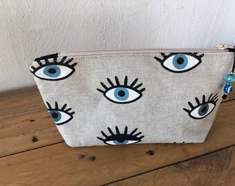 evil eye makeup bolsa