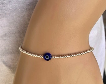 Silver evil eye beaded bracelet