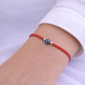 Red String Evil Eye Armband: Edelstahlperlen, verstellbarer Knoten