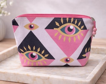 Trousse de maquillage tissus motif oeil