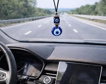 Achteruitkijkspiegelbedel van glas met boze oog: autobescherming