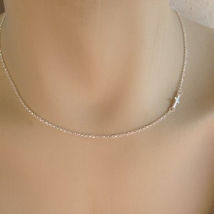 Women's sideways cross silver necklace image 2