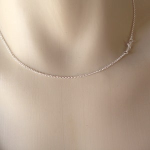 Women's sideways cross silver necklace image 6