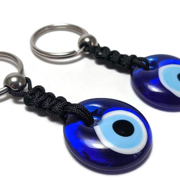 Porte cles oeil bleu en verre acier ou laiton