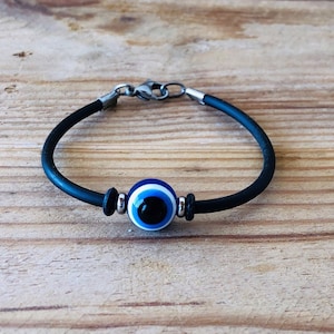 Griechisch Gummi Evil Eye Armband, Geschenk für sie oder ihn schützen, Made in Griechenland, Blau Glücksbringer, Trendy Black Eye Charm, Unisex Schmuck